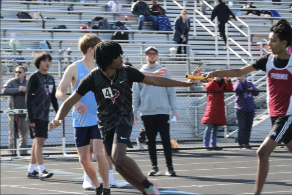 Senior Jamari Anthony runs the Boys 4x400 Meter Relay Finals.